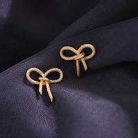 Gold Plated Alloy Blow Knot Stud Earring