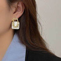 White Shell Square Hollow Irregular Metal Stud Earrings