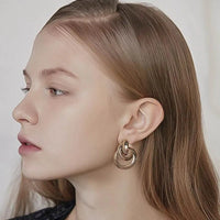Aferando Gold Plated Elegant Geometric Knotted Multi-Circle Stud Earrings for Women, unique knot design, sophisticated, luxurious