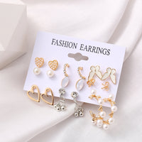 Aferando Combo Set of 9 Stud Earrings in variety of styles and colors. Perfect for everyday wear and special occasions. Hypoallergenic and safe for sensitive ears.