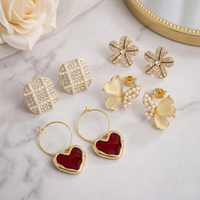 4-in-1 Gold Glam Earring Set — Red Heart Hoops, Crystal Flower, Pearl Grid & Butterfly Studs