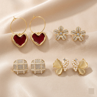 4-in-1 Gold Glam Earring Set — Red Heart Hoops, Crystal Flower, Pearl Grid & Butterfly Studs