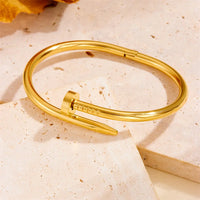Cartier-Inspired 18K Gold Plated Stainless Steel Nail Bangle Bracelet
