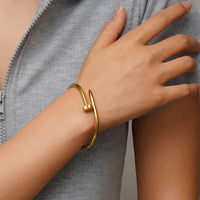 Anti-tarnish nail bangle bracelet for women in 18K gold plated 304 stainless steel — minimal stacking bangle by Aferando