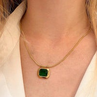 Woman wearing Esme emerald green crystal pendant necklace, anti-tarnish 18K gold plated skin-safe daily-wear jewellery by Aferando