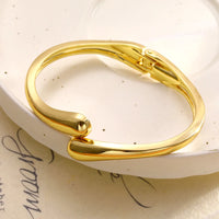 Gold Plated Asymmetrical Adjustable Twist Cuff Water Drop Design Bracelet