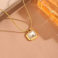 Anti-tarnish 18K gold plated crystal pendant necklace with emerald-cut crystal on gold snake chain, skin-safe daily-wear jewellery by Aferando