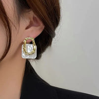 White Shell Square Hollow Irregular Metal Stud Earrings