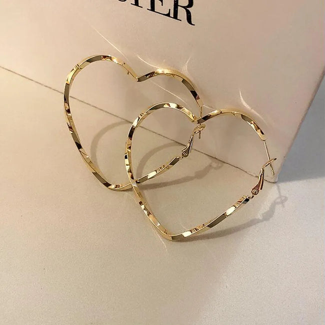 Aferando Gold Plated Simple Heart Shaped Big Hoop Earrings for Women - Close-Up View