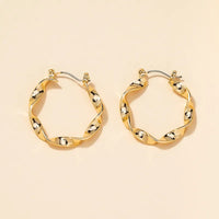 Aferando Gold Plated Unique Classy Twisted Metal Hoop Earrings for Women
