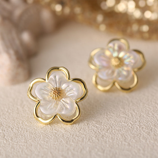 Aferando's Korean Style Gold Plated Flower Shape Pearl Stud Earrings for Women, featuring a unique flower shape design with a delicate pearl in the center, crafted in high-quality gold plating for a stylish and long-lasting accessory.
