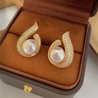 Elegant Gold Plated Irregular Rhinestone Fishtail Water Drops Stud Earring with Big Pearl for Women by Aferando