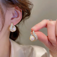 Elegant Gold Plated Irregular Rhinestone Fishtail Water Drops Stud Earring with Big Pearl for Women by Aferando