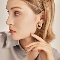 Aferando Gold Plated Geometric Knot Stud Earrings For Girls and Women 