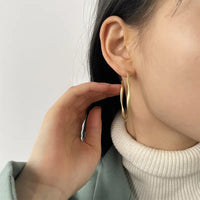 Aferando Gold Plated Simple Geometric Pattern Twisted Metal Hoop Earring for Women