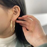 Aferando Gold Plated Simple Geometric Pattern Twisted Metal Hoop Earring for Women