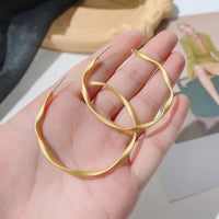 Aferando Gold Plated Simple Geometric Pattern Twisted Metal Hoop Earring for Women